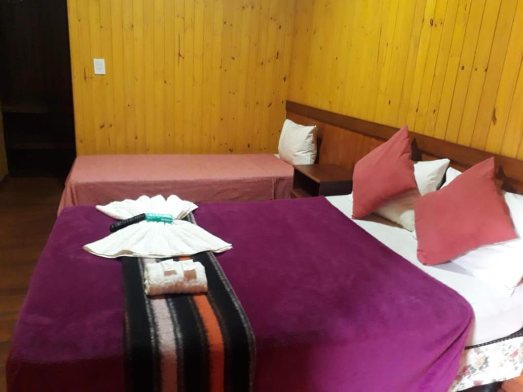 Petit Hotel Caraguata Puerto Iguazu Exterior photo